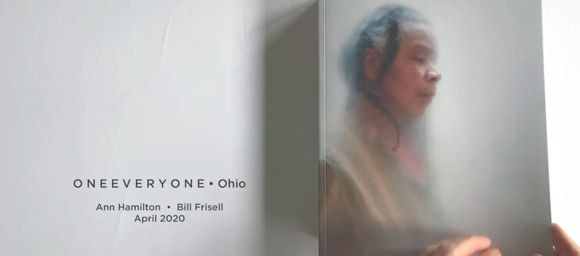Opening image from the video of artist Ann Hamilton's ONEEVERYONE book. Dancer Bebe Miller is seen on the cover.